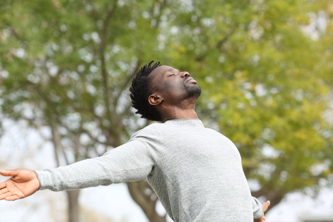 Man Inhaling the Fresh Air 